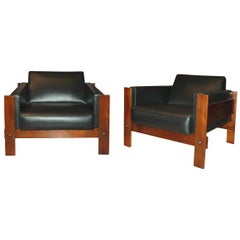 Pr. of rosewood lounge chairs w/leather upholstery