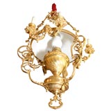 A CONVERTED OIL LAMP CHANDELIER