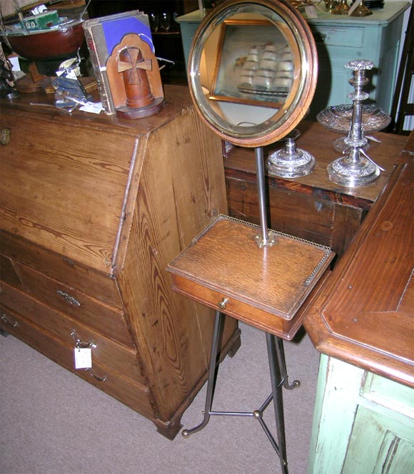 A Simple and Elegant Oak Shaving Stand. Original Beveled Mirror and Brass Reveal.Single Drawer. Brass Gallery and Brass and Steel Base.