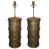 PAIR OF LARGE BAMBOO FORM LAMPS WITH A RICH LEAFED FINISH.