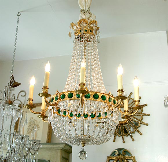 Gilt bronze crystal chandelier with emerald green cabochon crystals set into the gilt bronze banding.  9 candlelights.