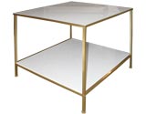 Pair of white milk glass and brass side tables