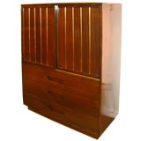 Tall storage unit in mahogany designed by Harvey Probber