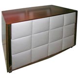 Padded leather dresser by Gilbert Rohde