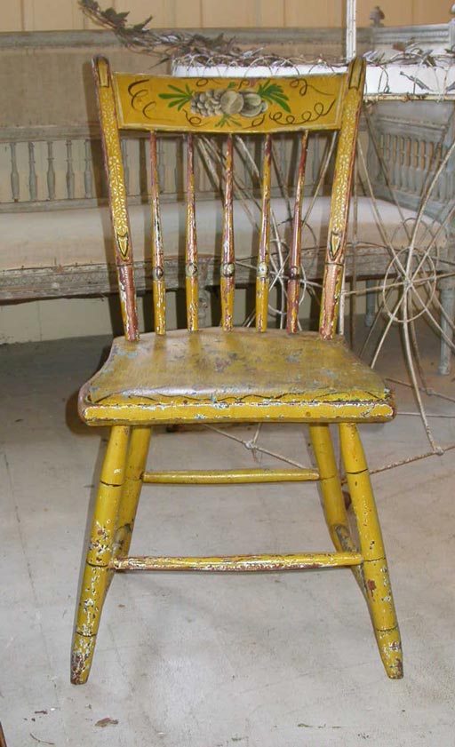 Set of Six Hitchcock chairs in old yellow paint with silver green and black stencilling of leaves and fruit