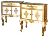 Italian gilt  and painted wood small cabinets