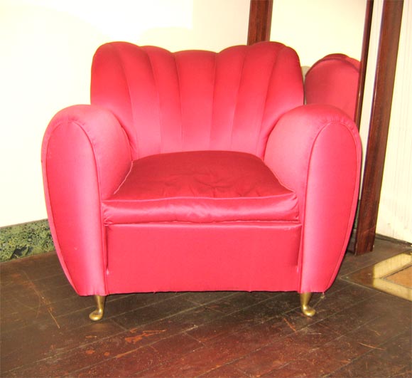 Two armchairs in satinated pink fabric with original gilt bronze legs.