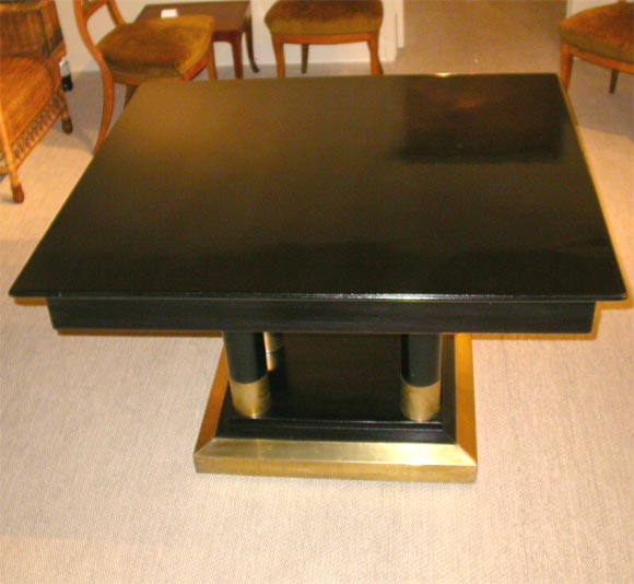 Ebonized Mahogany and Brass Four Column Table