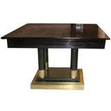 Ebonized Mahogany and Brass Four Column Table