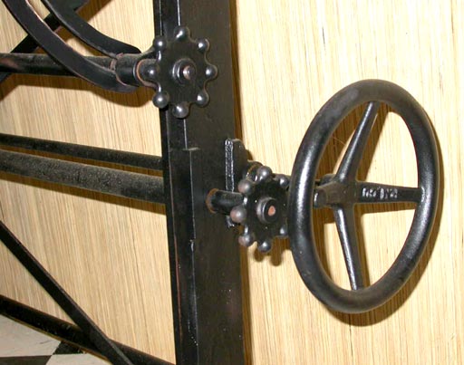 Cast iron drafting table base with milk glass top in console width.