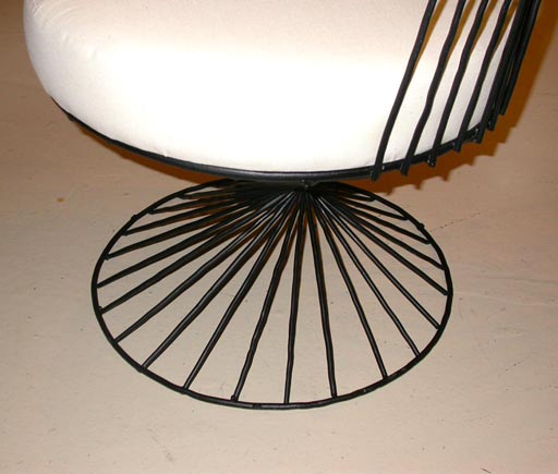 A suite of painted metal table & four barrel back chairs, Mathieu Mategot.   Table measures 16 1/2 h x 21 1/2 diameter.