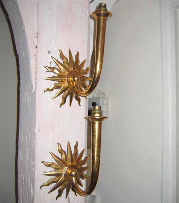 Two Gilt Metal Sun Sconces Attributed to André Arbus