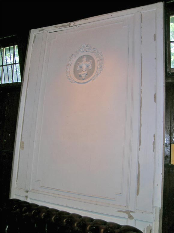 Large painted curved boisere panel. Consisting of rectilinear mouldings and a circular medallion.