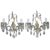 Pair of antique French bronze sconces with crystals