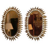 pr of oval mirrors