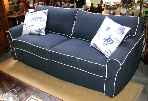 Slipcovered Sofa in Navy Blue Linen (grade 4) with White Contrasting Welt.