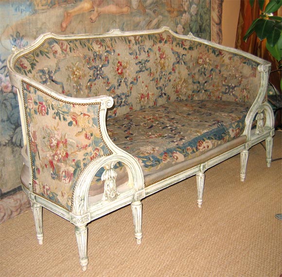 Eighteenth century Louis XVI canapé with Aubusson upholstery.