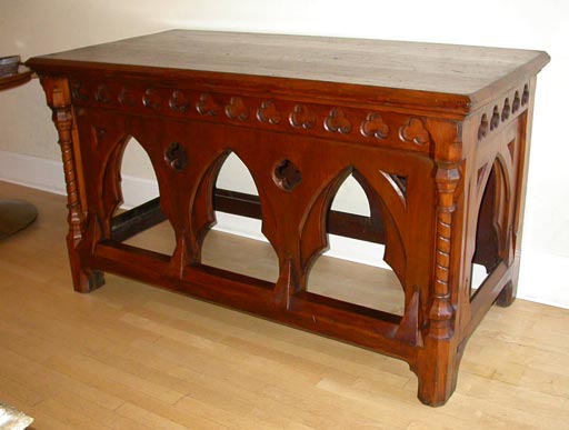 An English, neo-gothic style stained pine console table.