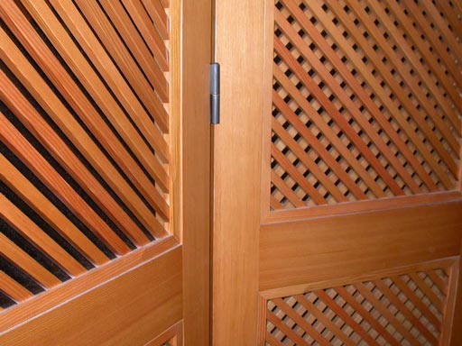 American pair of custom bi-fold doors w/decorative glass panells