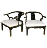 pair of chinese modern armchairs in black lacquer