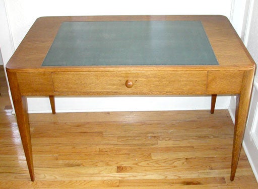 Oak desk with 1 drawer and dark green writing surface, for La Cite Universite - Paris 1933. Desk is signed.