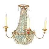 Pair of large iron and crystal sconces