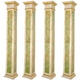 * 20122 Set of four Italian faux marbre and gilded wood columns