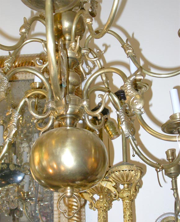 Bronze chandelier with fish motifs