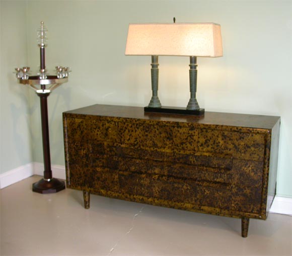 William Haines 9 drawer chest clad in tortoise shell print leather