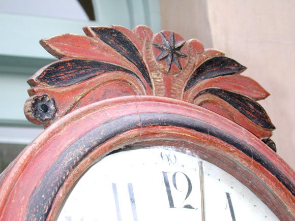 SWEDISH ROCOCO STYLE IRON-RED PAINTED TALL CASE CLOCK