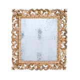 ITALIAN ROCOCO STYLE IVORY-PAINTED AND PARCEL-GILT MIRROR
