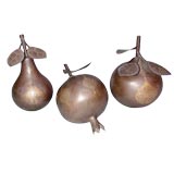 THREE INDIAN METAL MODELS OF A PEAR, A POMEGRANATE AND AN APPLE
