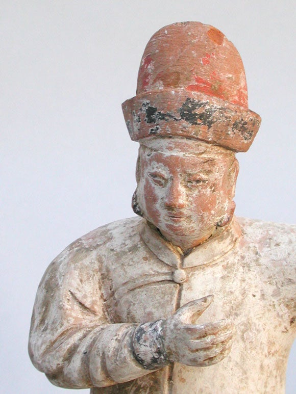 PAIR OF CHINESE POLYCHROMED EQUESTRIAN FIGURES