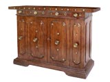 Antique A MASSIVE ITALIAN BAROQUE WALNUT TWO-DOOR CREDENZA