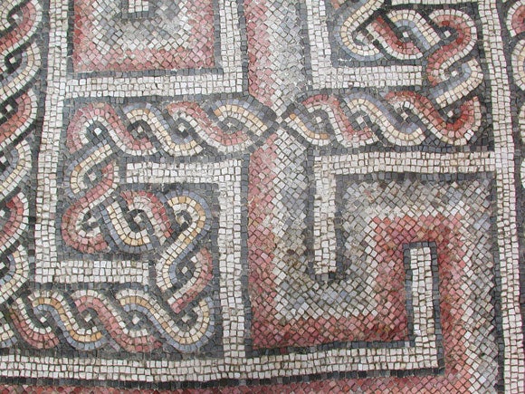 A RARE ROMAN BYZANTINE SQUARE MOSAIC PANEL WITH ROPETWIST AND RECIPROCATING FRET BAND.  The square, complete panel of intricately arranged mosaic tiles depicting an undulating ropetwist cable mimicked by a secondary, static reciprocating fret band;