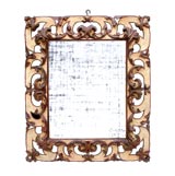 ITALIAN BAROQUE IVORY LACQUERED AND SILVER-LEAF MIRROR