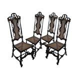 FOUR SWEDISH BAROQUE EBONIZED AND PARCEL-GILT SIDE CHAIRS