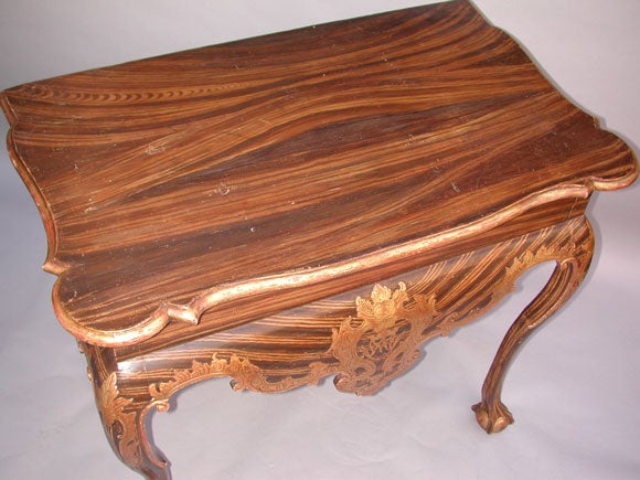 PORTUGUESE ROCOCO FAUX-ROSEWOOD PAINTED AND PARCEL-GILT CONSOLE
