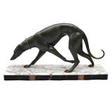 FRENCH ART DECO PATINATED METAL MODEL OF A STRIDING GREYHOUND