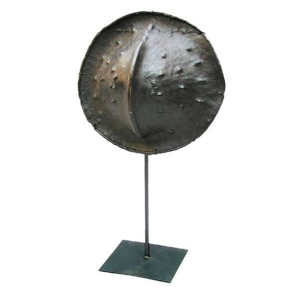 A LARGE AND UNUSUAL AFRICAN RHINOCEROS-SKIN CIRCULAR SHIELD