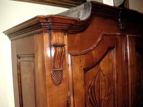 ITALIAN NEO-CLASSICAL CHERRYWOOD TWO-DOOR ARMOIRE