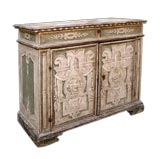 A BOLDLY-SCALED ITALIAN BAROQUE PALE GREEN GROUND CREDENZA