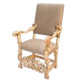 ITALIAN BAROQUE CARVED AND GILTWOOD UPHOLSTERED OPEN-ARM CHAIR