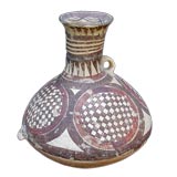 A DIMINUTIVE NEOLITHIC IRON-RED AND BROWN-PAINTED POTTERY JAR