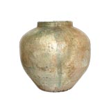 A BOLDLY-SCALED CHINESE IRIDESCENT GREEN-GLAZED POTTERY JAR