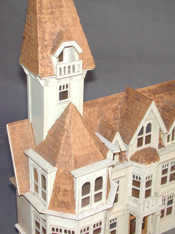A DELIGHTFUL IVORY-PAINTED FIBRE BOARD MAQUETTE OF THE ILLUSTRIOUS MARK HOPKINS MANSION ON NOB HILL IN SAN FRANCISCO.  The Neo-Gothic-inspired Victorian style model surmounted by an elegant watch tower with balcony above a sloping shingled roof with