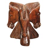 Carved horse heads round side table