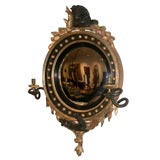 REGENCY GILTWOOD AND EBONISED CONVEX MIRROR