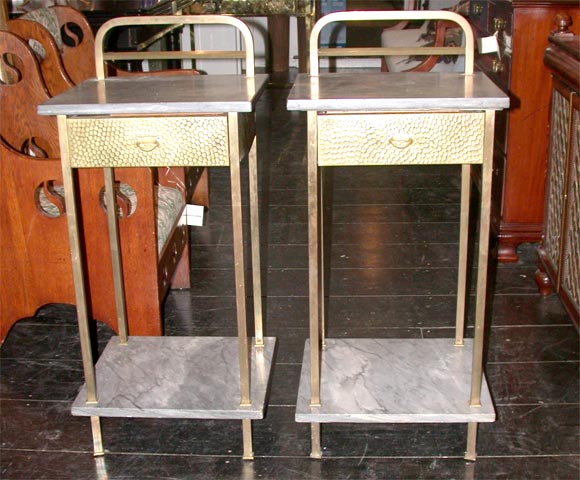 CIRCA 1910 BRASS AND BLEU TARQUIN MARBLE MAKE UP THESE BEAUTIFUL TABLES. THE HAMMERED BRASS DRAWERS ARE ON ALL SIDES