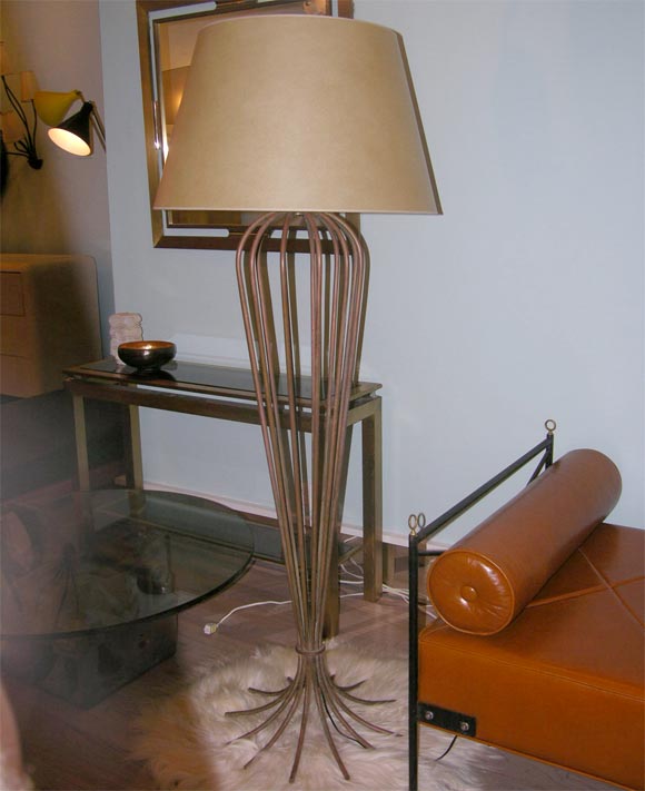 Large floor lamp by Jean Royere, the Mille pattes can be seen in a archivial picture page 163 of the exhibition catalog of the 1999 Royere retrospective held at the Musee des arts decoratifs in Paris.<br />
the reference is from the 